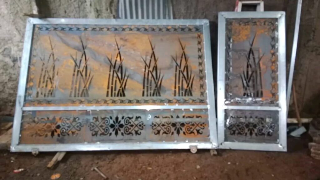 pembuatan pintu dorong laser cutting